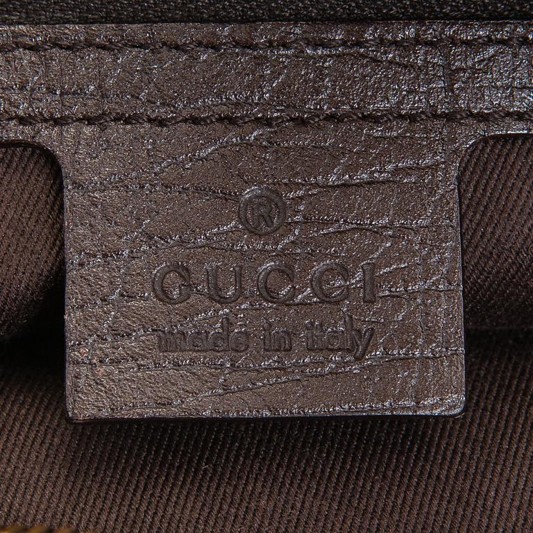 Gucci, a 'Horsebit GG Canvas Hobo Bag'.