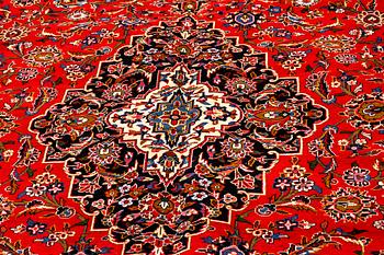 A Keshan rug, signed, 410 x 295 cm.