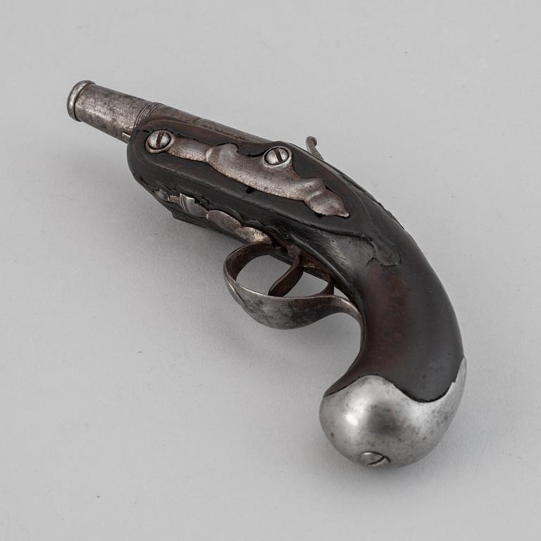 A 18th Century flintlock pistol.