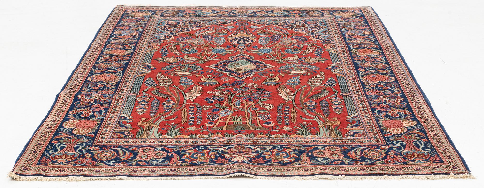 A semi-antique Kashan rug, approximately 200 x 134 cm.