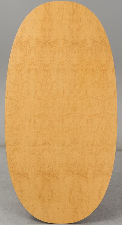 PIET HEIN & BRUNO MATHSSON, a curly birch veneered 'Superellips' table from Mathsson International.