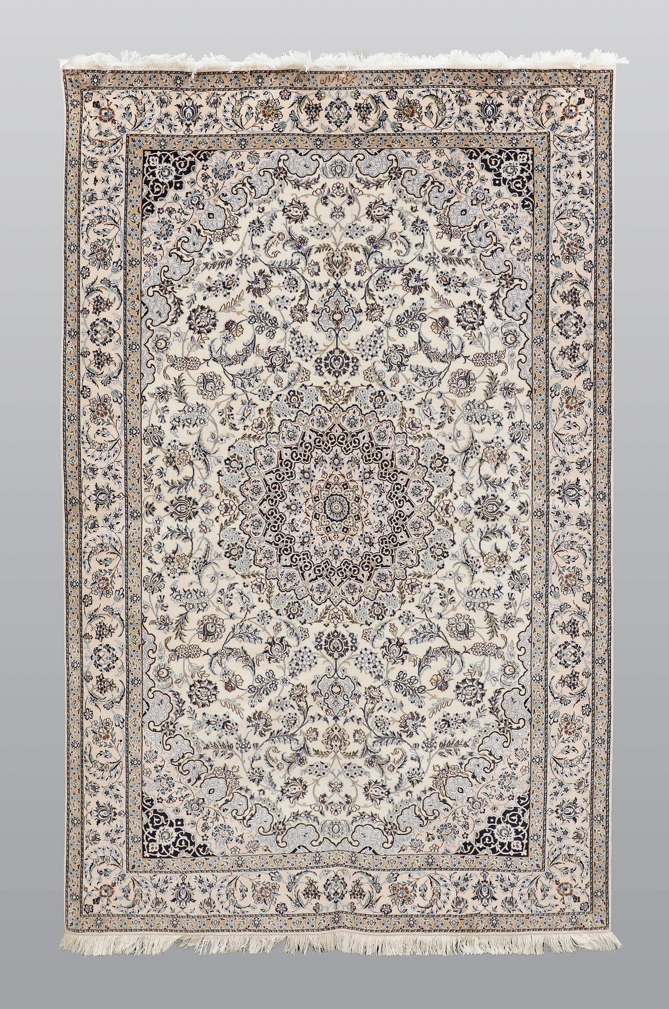 A carpet, Nain part silk so called 6 LAA, signed, ca 240 x 137 cm.