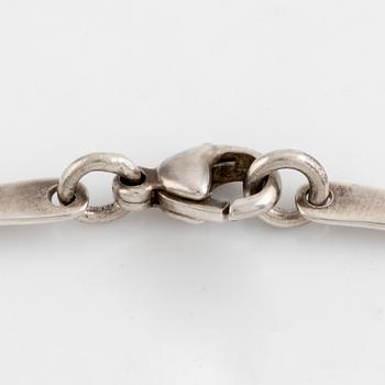 Annie Jägbeck silver necklace and earrings.