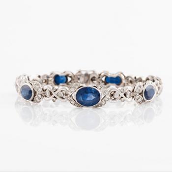 Sapphire and round brilliant cut diamond bracelet, ring and earrings.