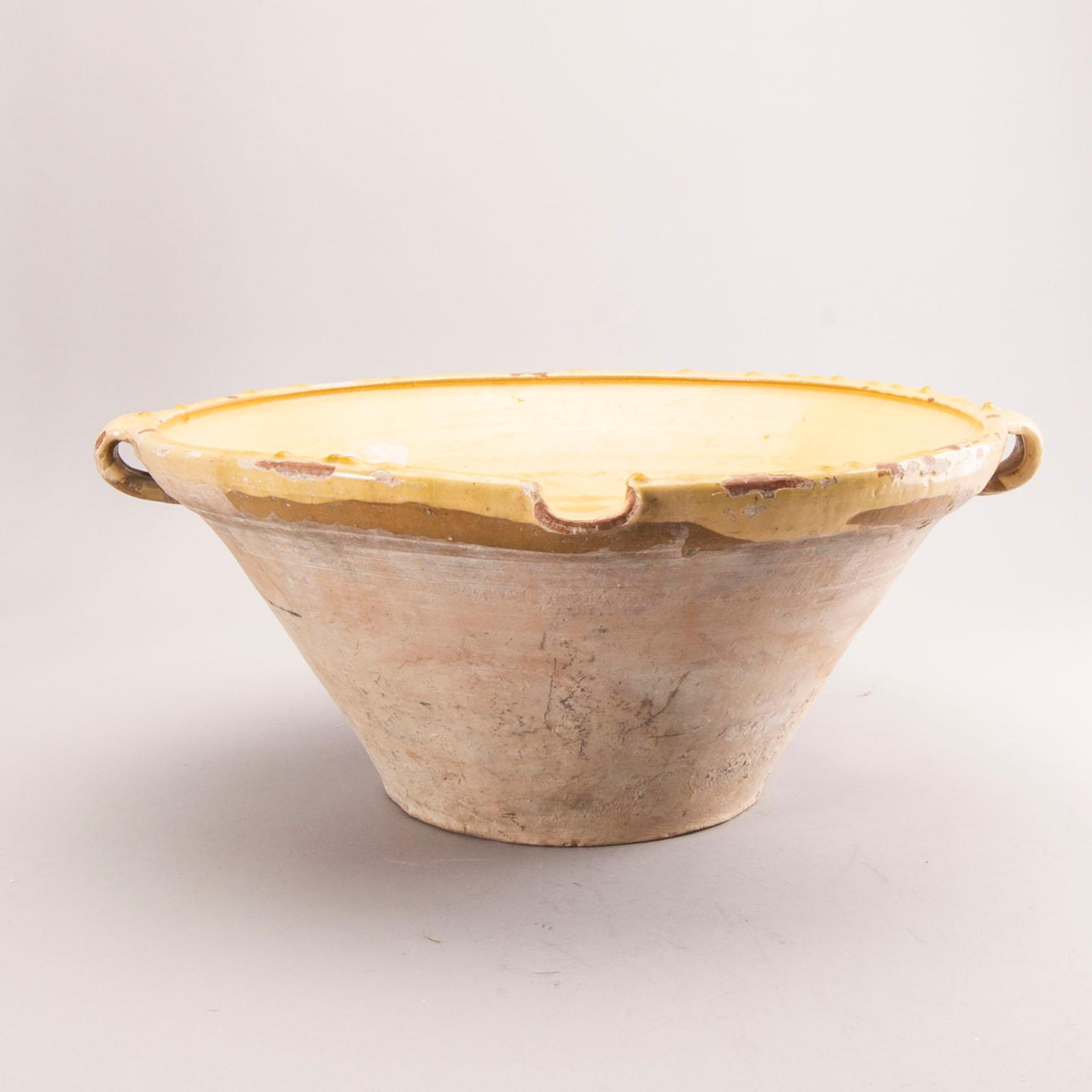 A French bowl, glazed earthenware, around 1900.