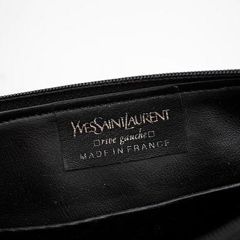 YVES SAINT LAURENT, a black suede shoulder bag.