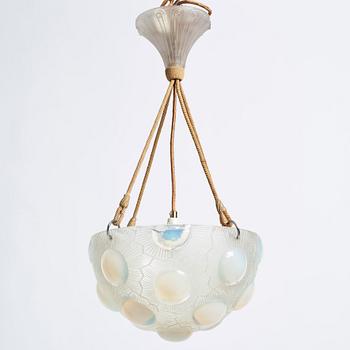 René Lalique, a 'Soleil' moulded opalescent glass ceiling light, France 1920-30s.