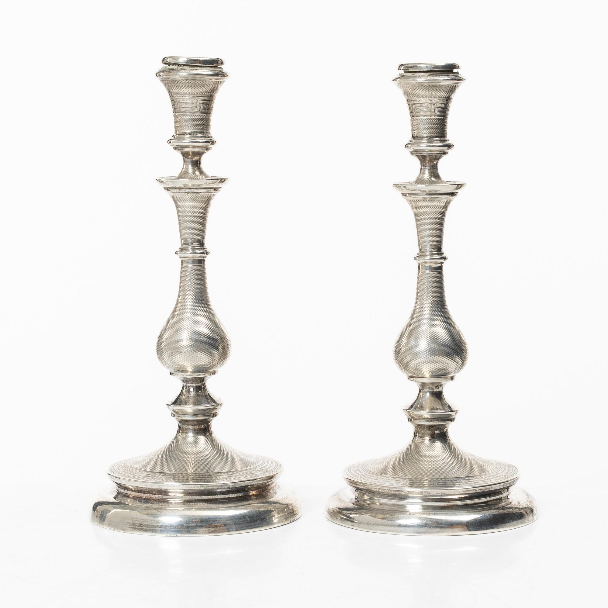 A pair of Swedish silver candelsticks, mark of Lars Larsson & Co,  Stockholm 1872.