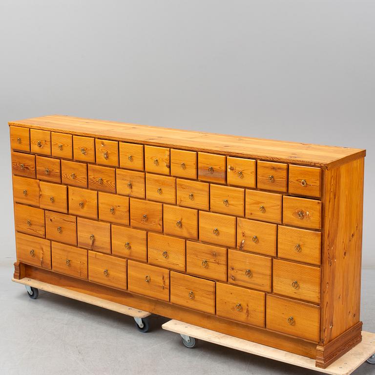 A late 19th century pinewood chest of drawers.