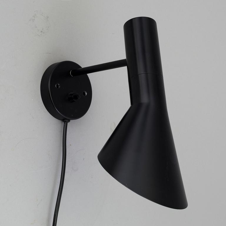 ARNE JACOBSEN, a "AJ" wall light, Louis Poulsen.