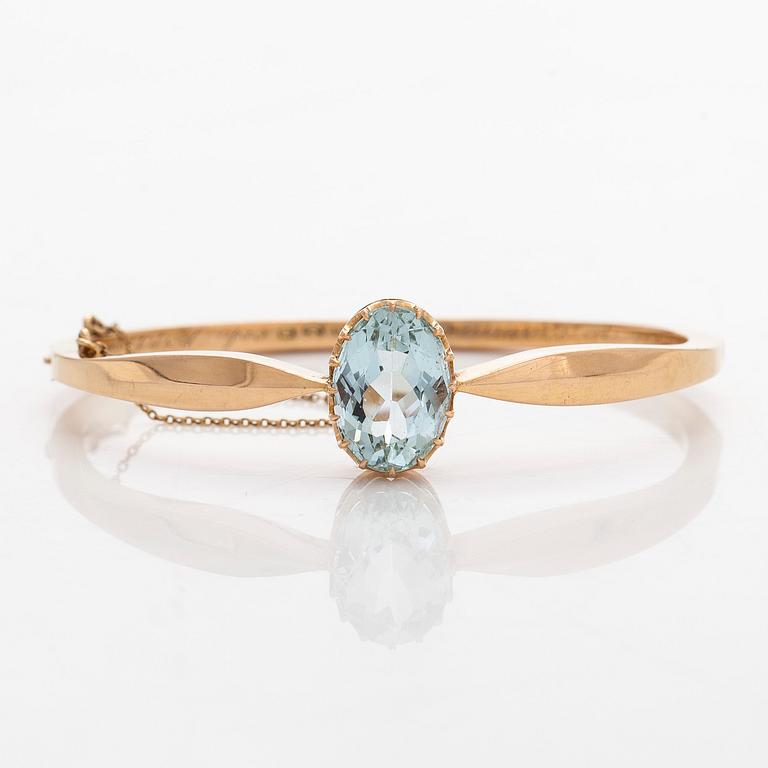 Rannerengas, viistehiottu akvamariini, 18K kultaa, Samuel Mika Westerlund, Porvoo 1927.