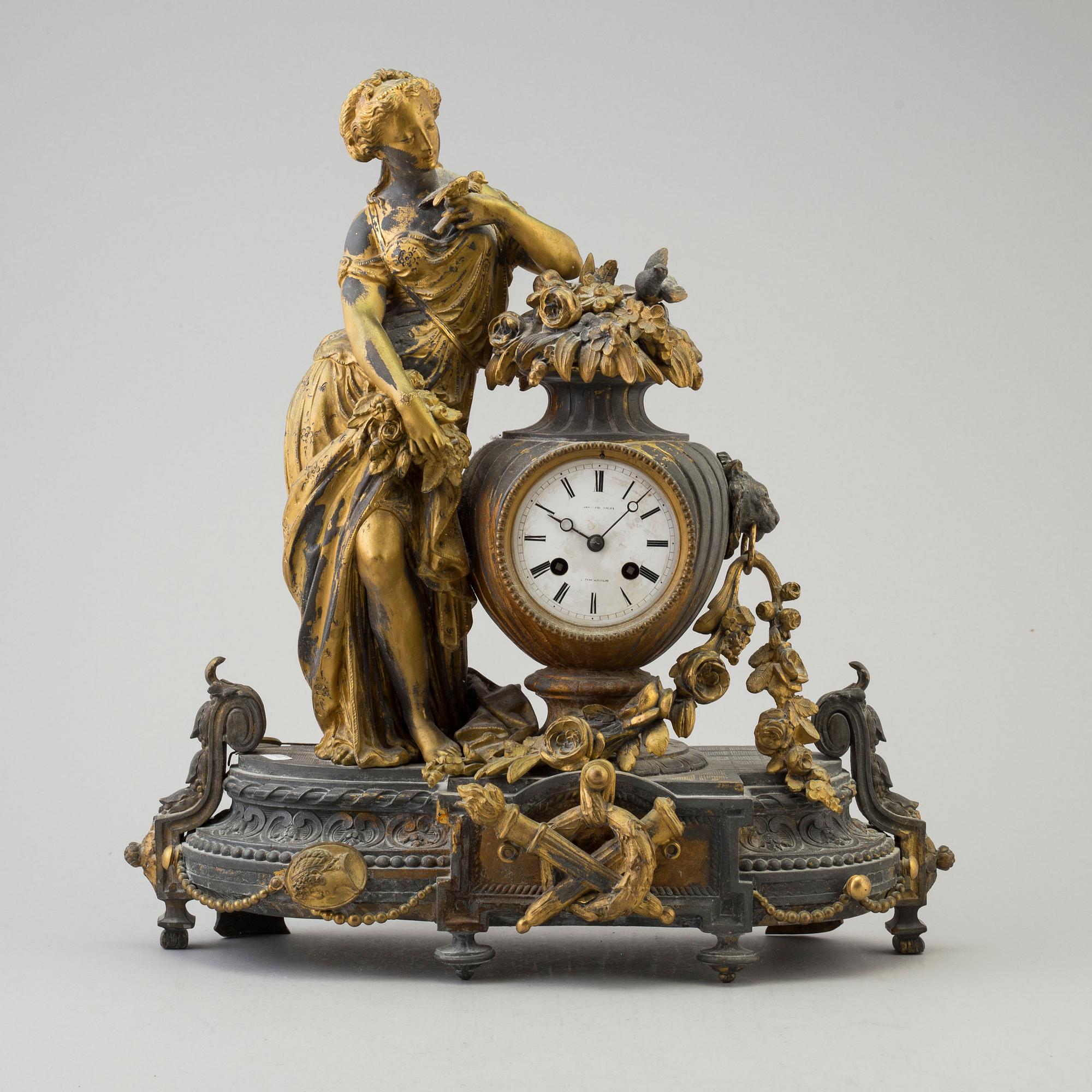 An end of the 20th century metal case mantle clock.