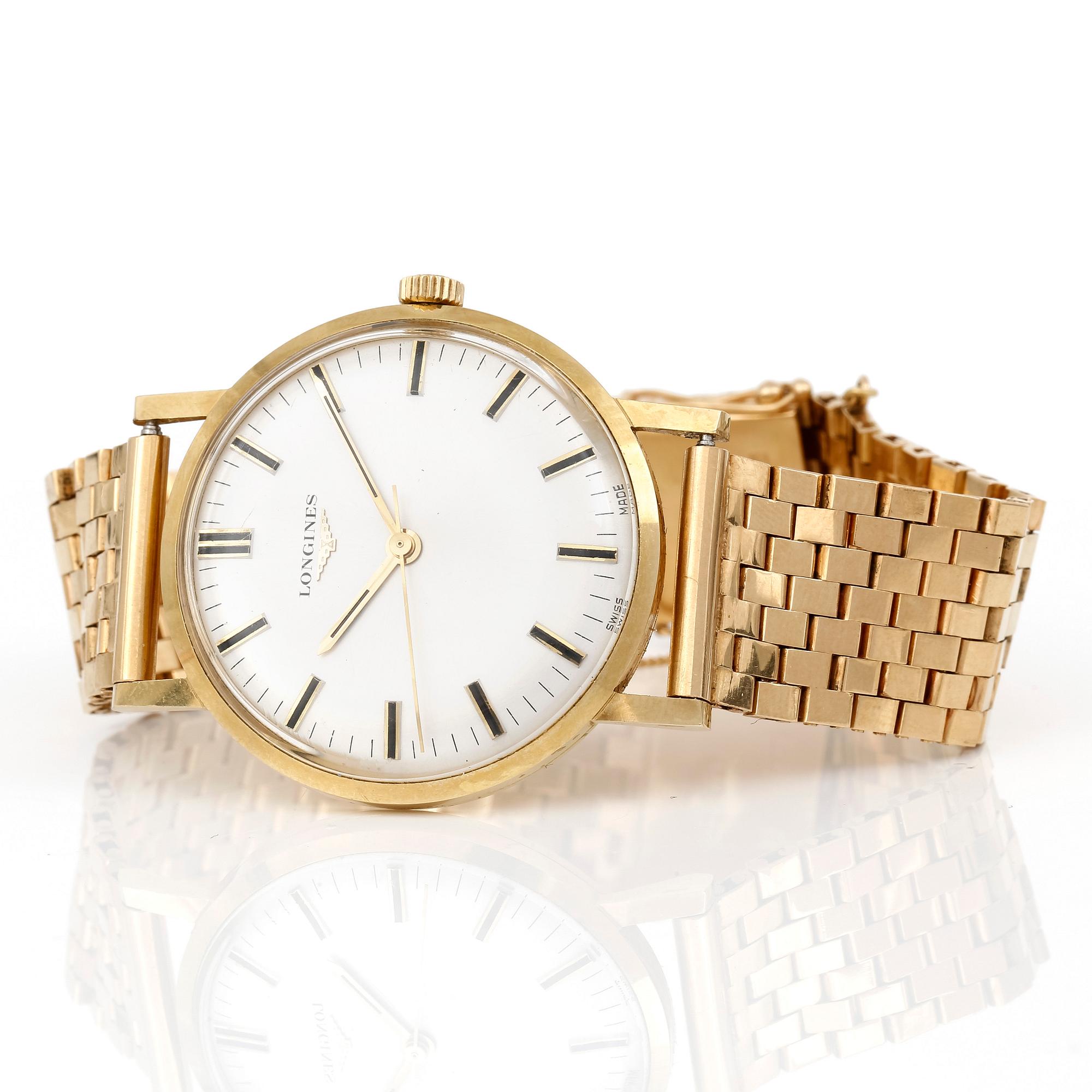 ARMBANDSUR, 18k guld, Longines ca vikt 78,3 gram.
