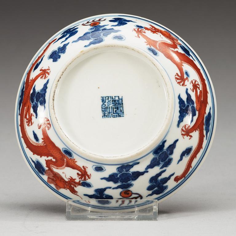 A blue and white enamelled dragon dish, Qing dynasty with hall mark.