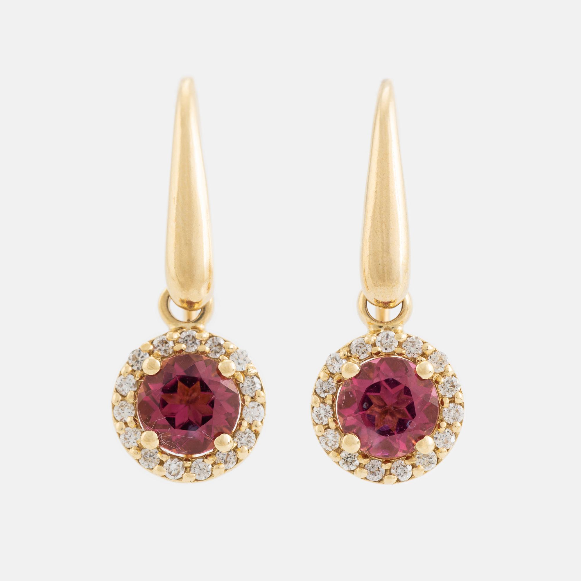 Pink tourmaline and brilliant cut diamond earrings.
