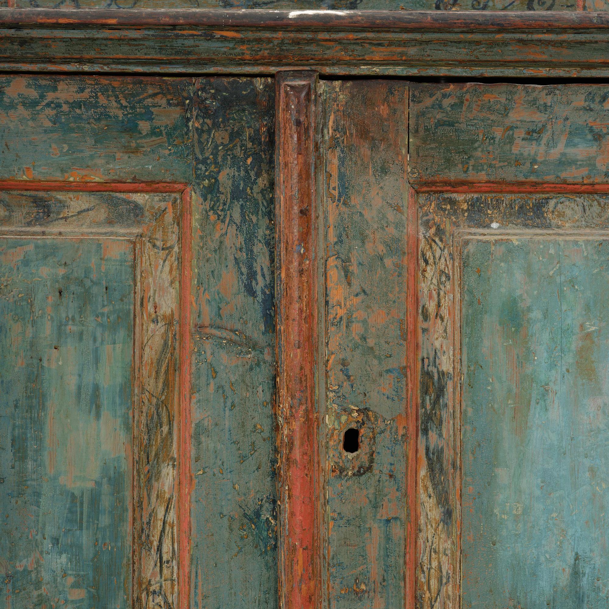 A Swedish polychrome-painted rococo cabinet, late 18th century.