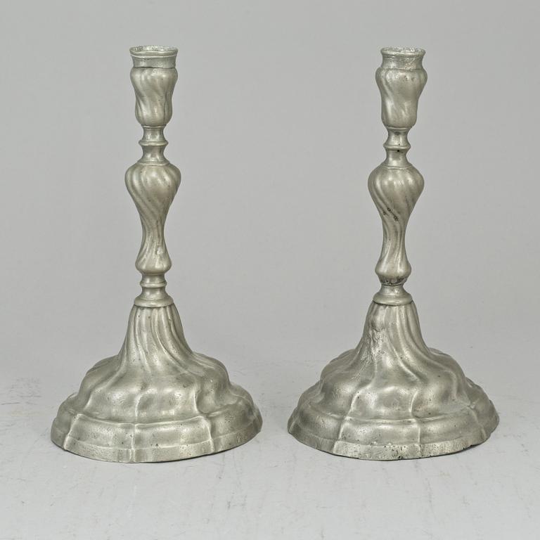 A pair of pewter rococo candlesticks. 18th century.