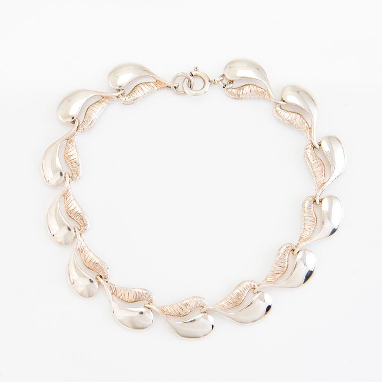 A set of sterling silver necklace and bracelet. Valo-koru, Turku.