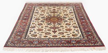 A semi-antique Isfahan rug, c. 225 x 143 cm.