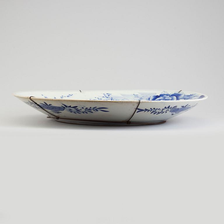 A massive blue and white Japanese dish, 20th century.