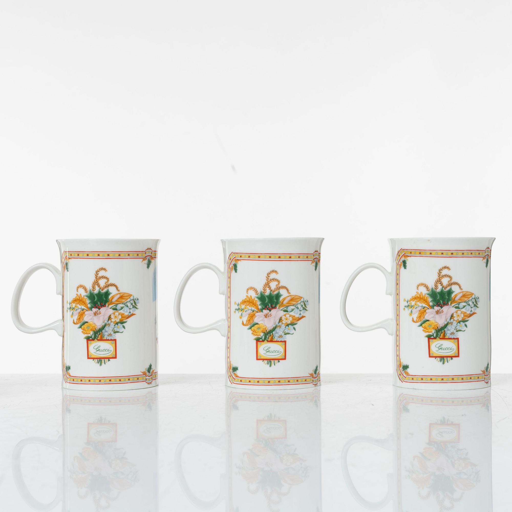 Gucci, A set of six vintage christmas mugs.