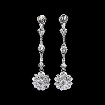 158. A pair of diamond earrings. Total carat weight circa 0.90 ct.