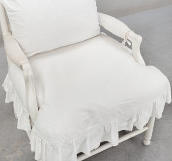 A Gustavian-style late 20th century armchair.