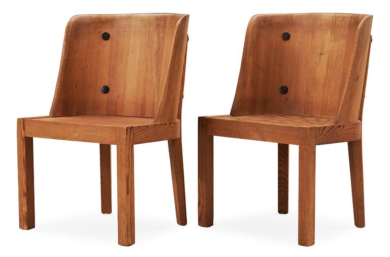 A pair of Axel-Einar Hjorth stained pine armchairs, 'Lovö', Nordiska Kompaniet, 1930's.