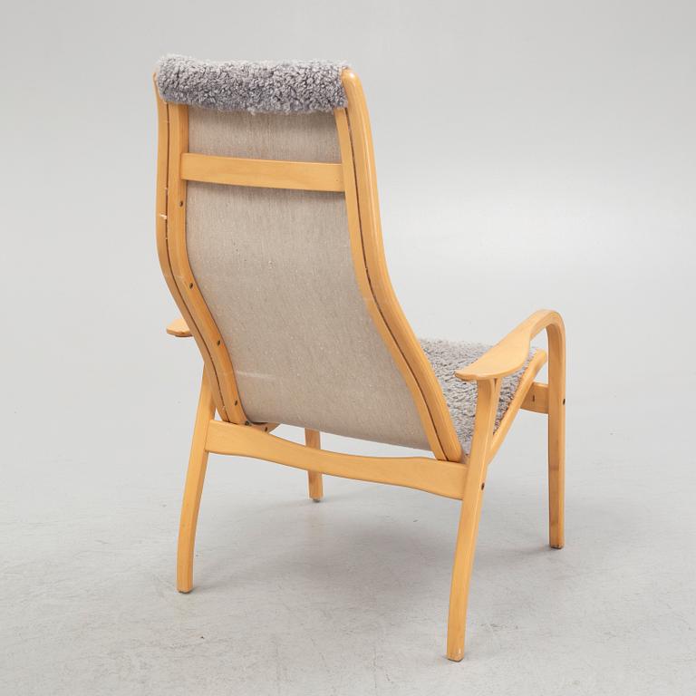 Yngve Ekström, fåtölj med fotpall, "Lamino", Swedese.