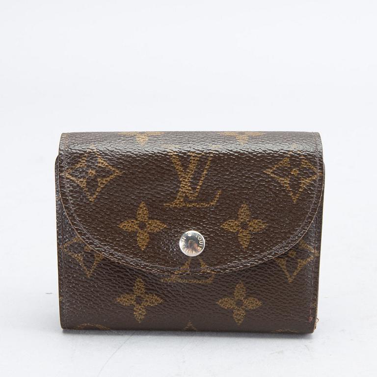 An 'Helene' wallet by Louis Vuitton.