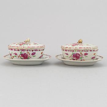 A pair of famille rose export porcelain butter tureens with dishes and covers, Qing dynasty, Qianlong (1736-95).