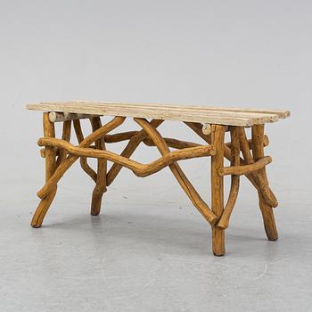 A wooden garden bench, 20th Century.