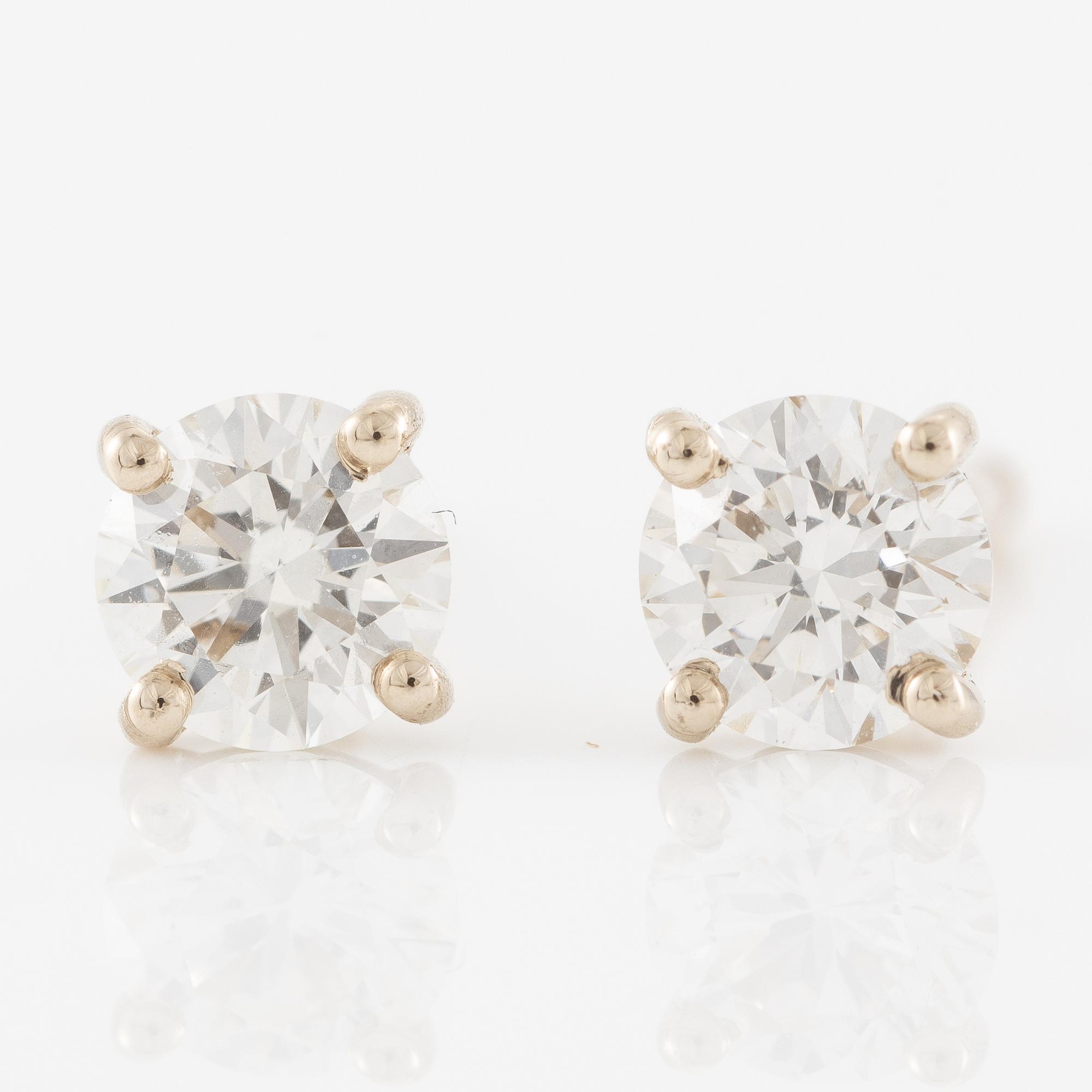 Earrings, a pair, 18K gold with brilliant-cut diamonds.