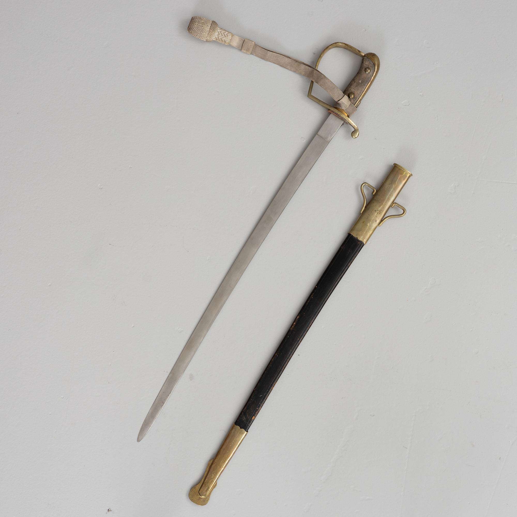 Polissabel, 1900-talets början, med balja.