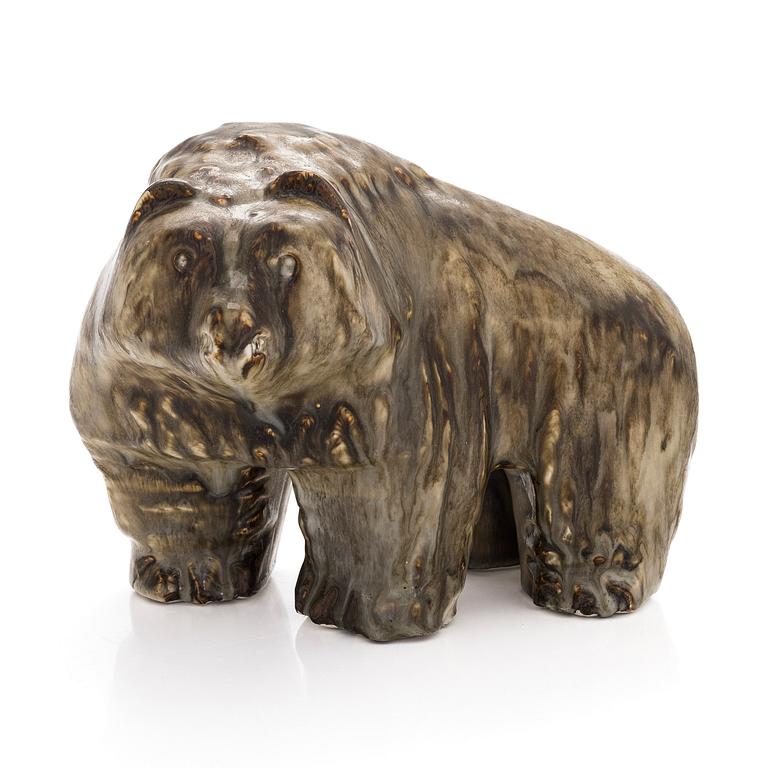 Taisto Kaasinen, a stoneware sculpture, signed T. Kaasinen Arabia Finland.