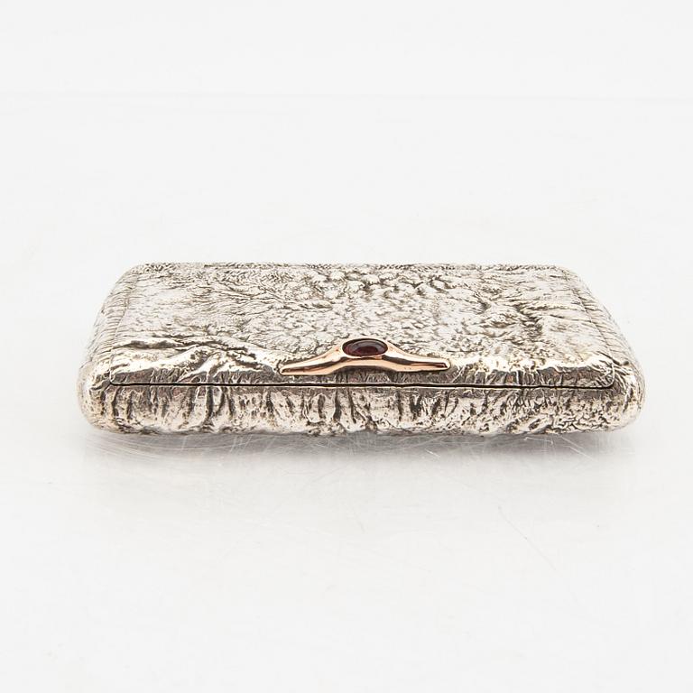 A Russian silver box with samorodok decoration and guilded inside, around 1900.