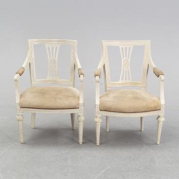 A set of two Gustavian arm chairs from the early 19th Century.