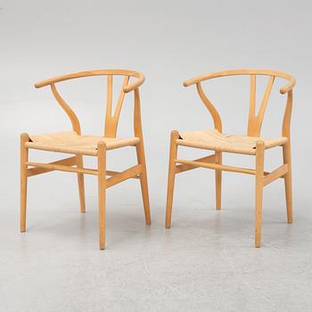 Hans J Wegner, a set of 6 model CH-24, "Wishbone" chairs, Carl Hansen & Son, Odense, Denmark, one dated 2007.