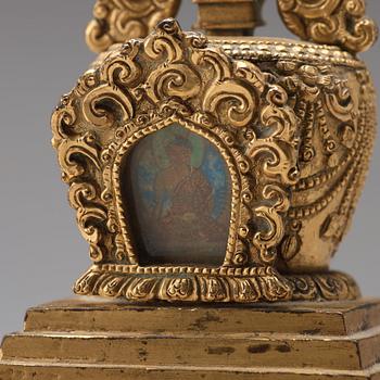 Two Tibetan gilt copper alloy stupa's, 19th Century.