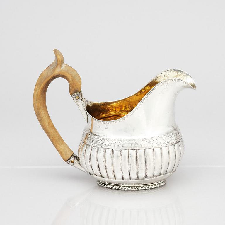 A 19th Century parcel-gilt silver cream-jug, mark of Johan Enock Franck.