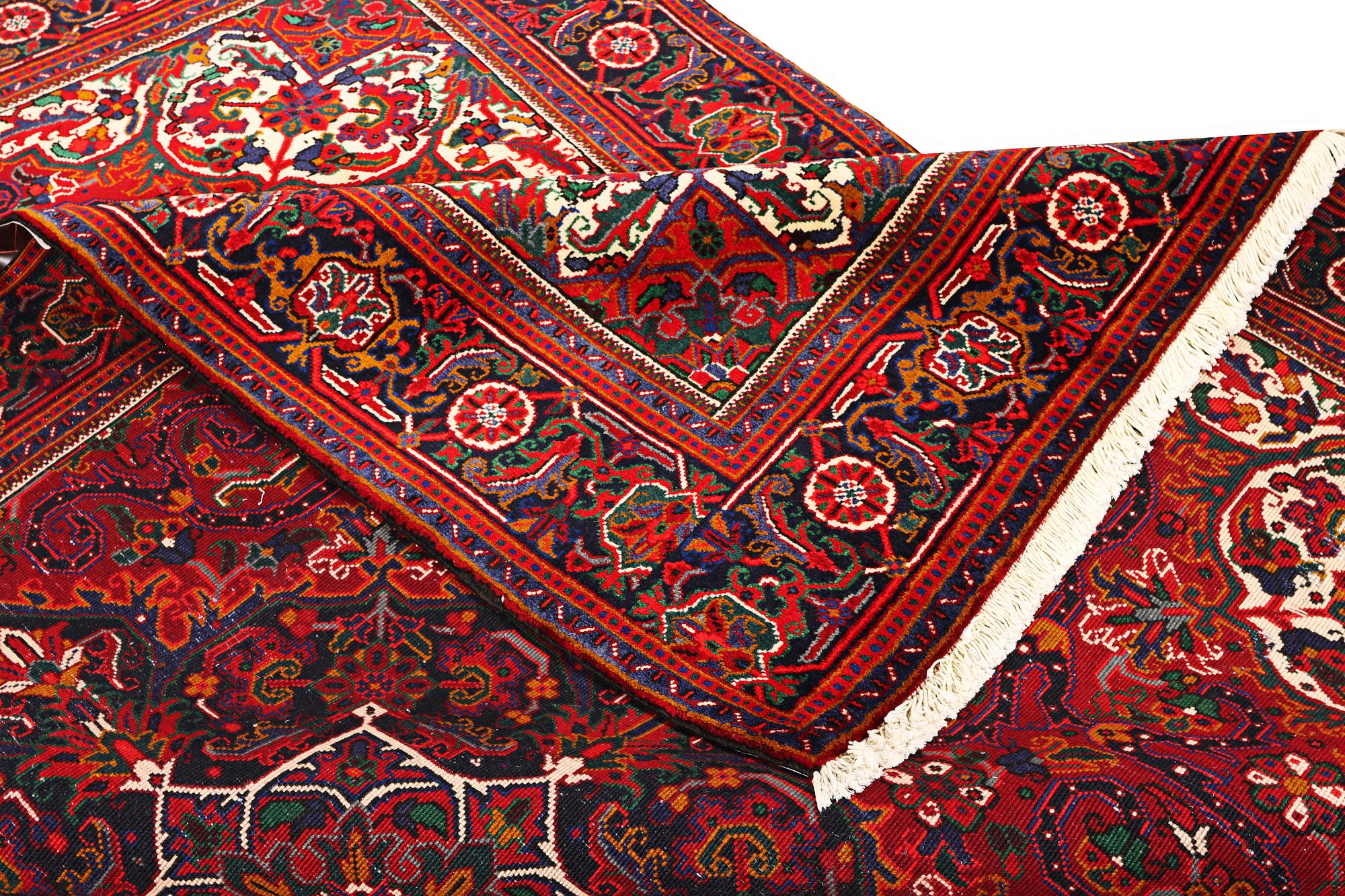 A Heriz carpet, c. 303 x 203 cm.