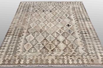 A Kilim carpet, ca 250 x 174 cm.