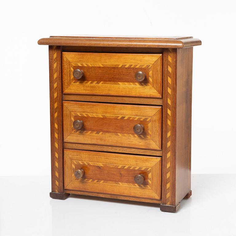 Miniatyrbyrå, 1900-talets början.