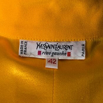 A blouse by Yves Saint Laurent, size 42 (FR).