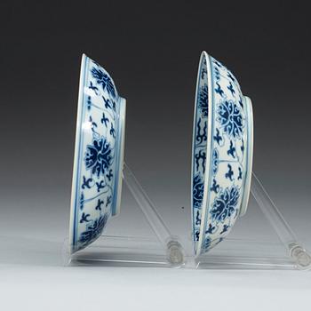 A pair of blue and white lotus dishes, Qing dynasty, Guangxu mark and period (1874-1908).