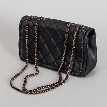 CHANEL, a black quilted fabric 'Flap Bag', 2015-2016.