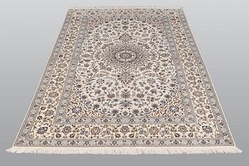 A carpet, Nain part silk s.k 6 LAA, 238 x 148 cm.