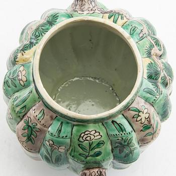 A set of three differently decorated tea pots with covers, Qing dynasty, 18century and 20th century.