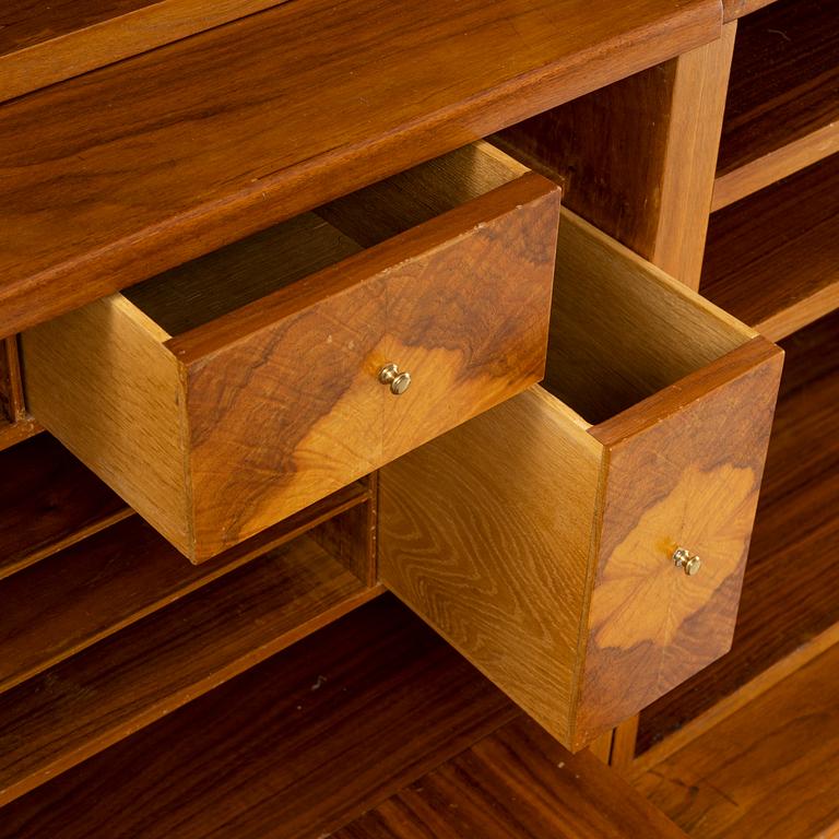 Carl Malmsten, a walnut veneer bookshelf in 4 parts, 1962.