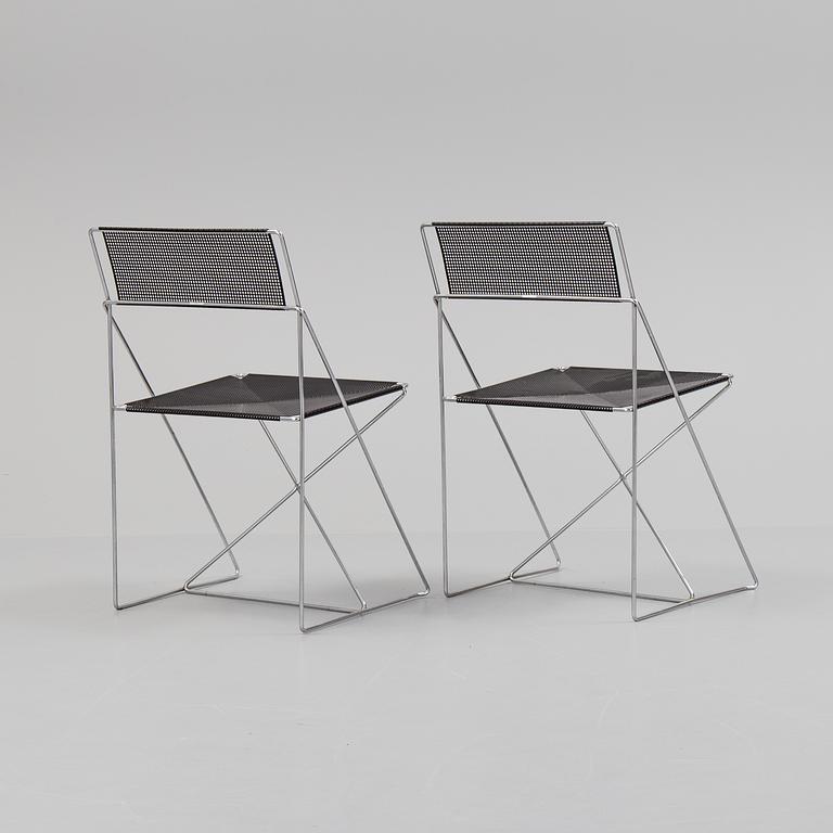 A set of four "X-line" chairs by Niels Jörgen Haugesen.